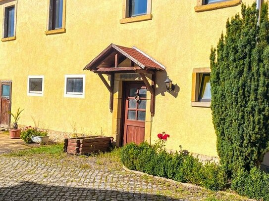 Idyllisch gelegenes Zweifamilienhaus in Niederau mit viel Ausbaupotenzial