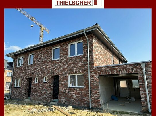 Verklinkerte rechte Rohbau-Doppelhaushälfte mit Garage zum Fertigstellen in Heinsberg-Porselen