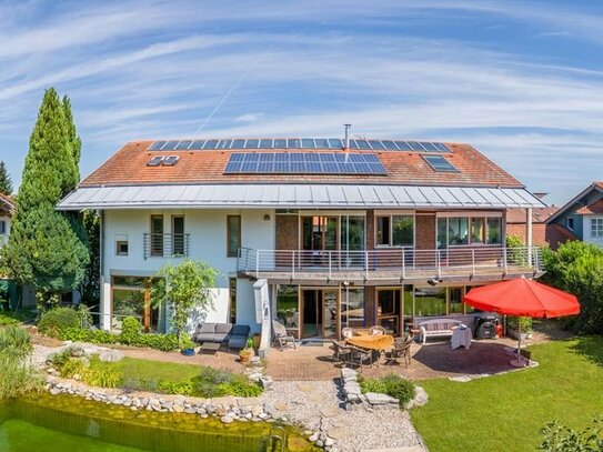 Architektenhaus mit Einliegerwohnung und Schwimmteich im sonnigen Teil von Neubeuern