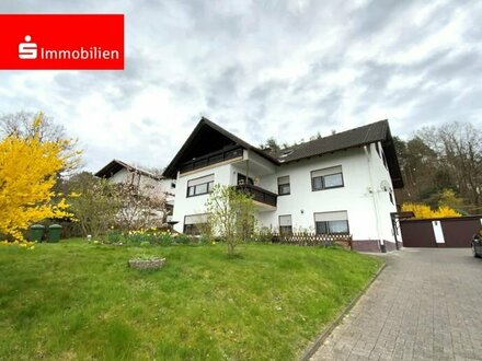 Dachgeschosswohnung mit eigenem Garten und Panoramablick