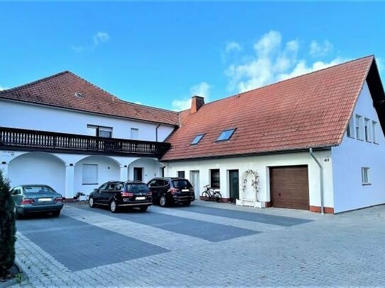 Interessantes Mehrfamilienwohnhaus mit Gewerbetrakt in Stemwede