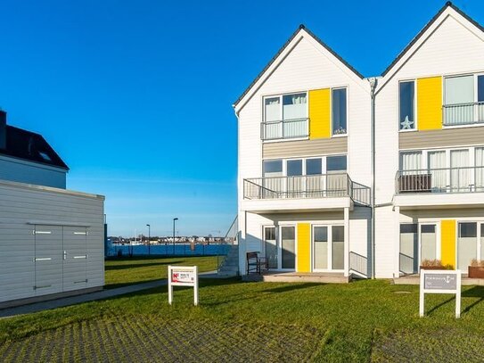 Wohnen über zwei Ebenen direkt am Meer mit Dachterrasse