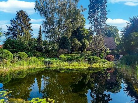 5.700,- pro QM- EXKLUSIVES WOHNEN mit Wasserblick auf 960 qm Sonnengrundstück mit Schwimmteich