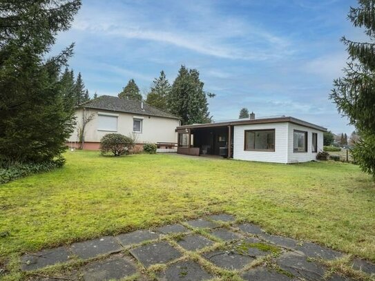 Wohntraum im Grünen: Gemütlicher Winkelbungalow mit weitläufigem Garten