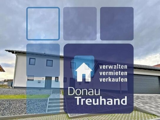 NEUBAU: hochwertige Doppelhaushälfte mit großer Doppelgarage, Terrasse und Garten