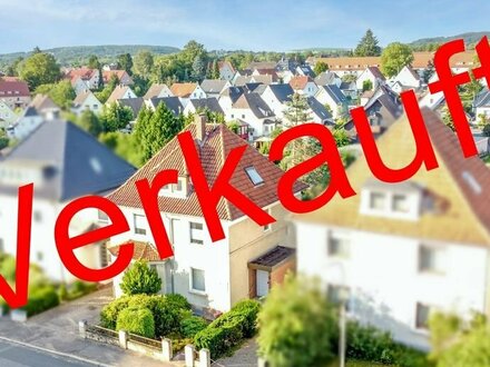 Attraktives Mehrfamilienwohnhaus mit zentralem Standort und weitläufigem Garten