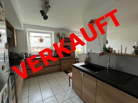 Schöne 4-Zimmer Eigentumswohnung mit Balkon und Tiefgaragenstellplatz