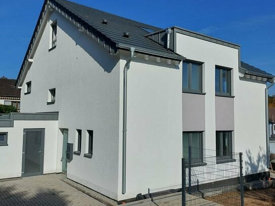 3-Zimmer-Wohnung mit energieeffizienter Luft-Wasser-Wärmepumpe sowie Terrasse und Garten in Hennef