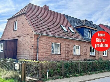 HORN IMMOBILIEN ++ Groß Flotow bei Penzlin, großes Grundstück mit Doppelhaushälfte