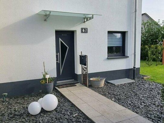 Modernisiertes Einfamilienhaus mit Garten zu verkaufen