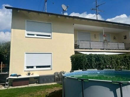 Zweifamilienhaus mit schönem Grundstück in attraktiver Lage