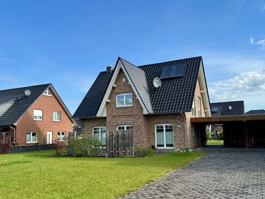 Neuwertiges Einfamilienhaus mit Südterrasse und Doppelcarport