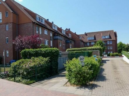 Familiengerechte 3-Zimmer-Wohnung mit Loggia, Tiefgaragen- und Außenstellplatz in zentraler Lage