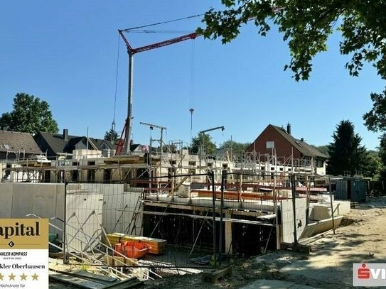 Neubau- Barrierearme Erdgeschosswohnung mit Gartensondernutzungsrecht und Tiefgaragenstellplatz