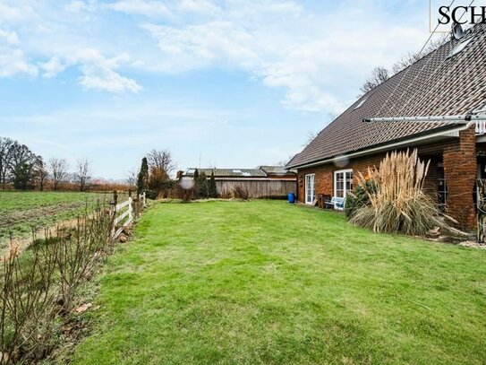 Großzügiges Zweifamilienhaus mit idyllischem Garten in Lindern, perfekt für Familien