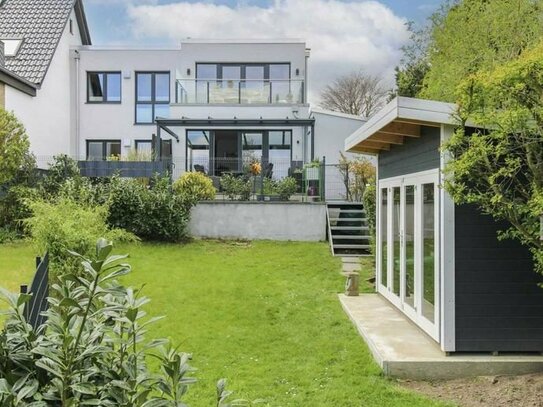 Strandnahe Ruheoase: Hochwertige Wohnung mit Garten und überdachter Terrasse in Scharbeutz