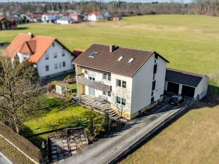 Wohnen im Grünen: Zweifamilienhaus mit großem Garten und viel Potenzial!