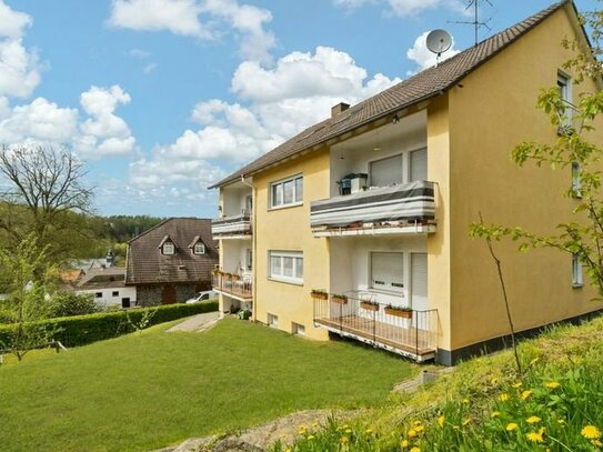 Lukrative Investition: Vollvermietetes 4-Familienhaus mit gepflegtem Garten