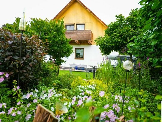 Schönes Einfamilienhaus mit großzügigem Garten in Top Lage