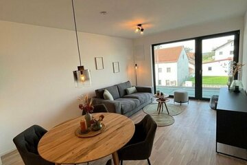 Neubau: hochwertige 2-Zimmer Wohnung im EG mit Terrasse, Garten und Einbauküche ( Ref. 0.05)