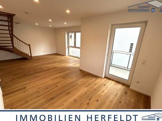 Moderne 5-Zimmer-Neubauwohnung über zwei Ebenen mit Balkon und stilvoller Ausstattung