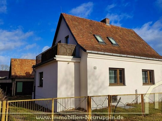 Einfamilienhaus in Wuthenow mit viel Nebengelass, Garage, Carport und kleinem Garten