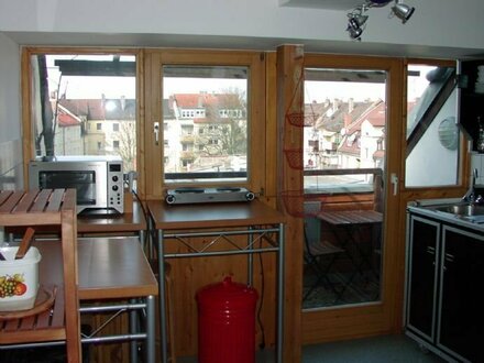 Vier-Zimmer-Wohnung im Dachgeschoss mit Balkon