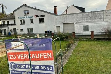 Top-Gelegenheit! Mehrfamilienhaus mit 3 Wohnungen und Nebengebäude in Bad Sobernheim zu verkaufen