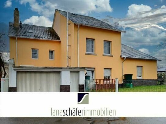 -RESERVIERT- Wittlich: Dreifamilienhaus mit Garage und Stellplätzen
