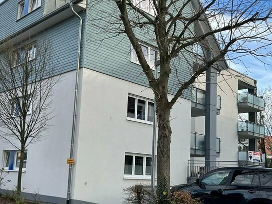 Attraktive 3-Zimmer-Wohnung mit Einbauküche, Gäste-WC, Balkon, Lift und TG im Zentrum von Haltingen!