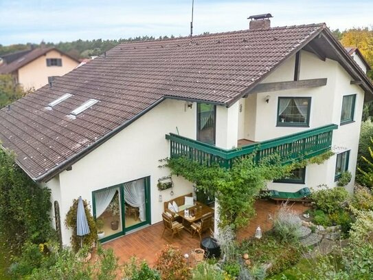 Großzügige Wohnung mit großen Balkon, Gartenanteil & Garage direkt am Zucheringer Wald