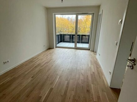KfW 40-Neubau-Wohnung mit EBK, Süd-Balkon, Echtholzparkett, HWR, Fahrstuhl, Tiefgarage