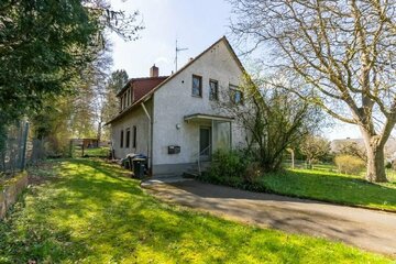 Zweifamilienhaus mit zwei Baugrundstücken am Deutschherrenberg