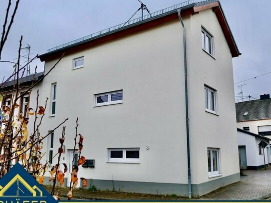 Schöne Neubauimmobilie mit Einliegerwohnung in zentraler Lage von Losheim zu verkaufen