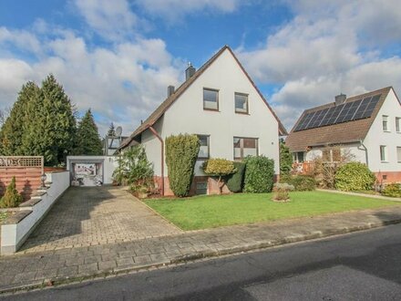 Charmantes Einfamilienhaus mit großem Garten und Garage in bevorzugter Wohnlage von Herrenshoff