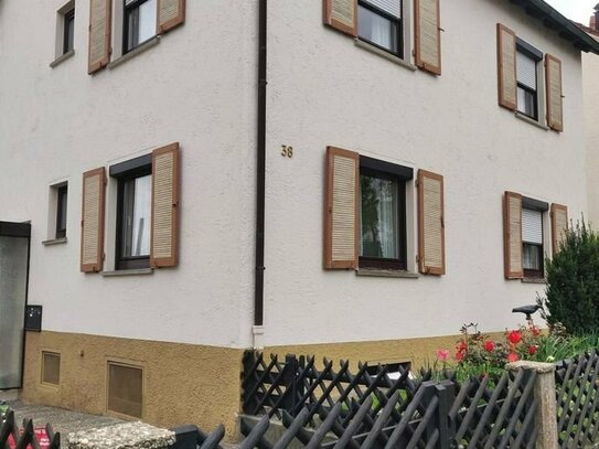 Vielseitiges Zweifamilienhaus auf sonnigem Grundstück