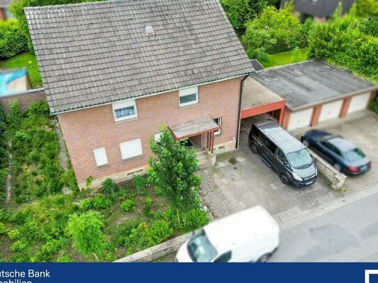 Attraktives Einfamilienhaus mit Potenzial zum Zweifamilienhaus, schönem Garten und Garage!