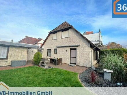 Top gepflegtes Einfamilienhaus mit drei Wohneinheiten, Garten und Doppelgarage