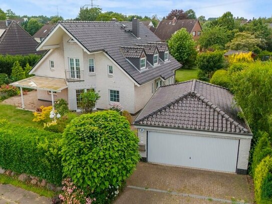 Sonniges Familienhaus mit großer Doppelgarage in angenehm ruhiger Wohnlage von Over