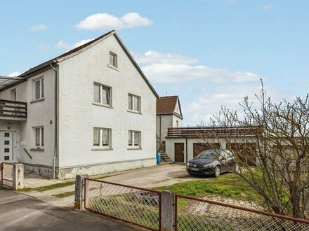 Einfamilienhaus mit Einliegerwohnung und großem Potenzial in Langenfeld.