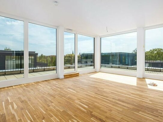 Dachgeschosswohnung mit umlaufende Terrasse und Open-Air-Panorama