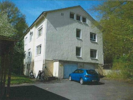 2-geschossiges Mehrfamilienhaus, incl. Garagen, Stellplätze u. angrenzendes baureifes Grundstück