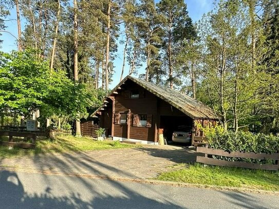 Modernes Holzhaus in Feriensiedlung - Leben auf dem Land