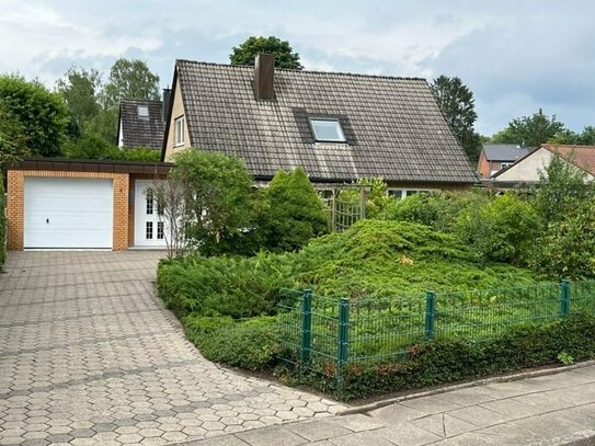 Familienfreundliches Einfamilienhaus mit großem Garten in bester Lage