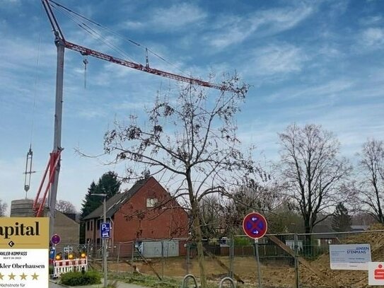 Neubau - Barrierearme Erdgeschosswohnung mit Gartensondernutzungsrecht inkl. Tiefgaragenstellplatz