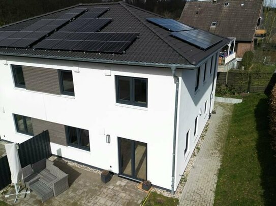 Neubau DHH in Lübeck Siems mit Solar, WP (KfW 40)