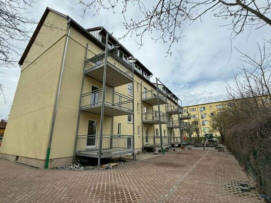 Erdgeschosswohnung mit Balkon