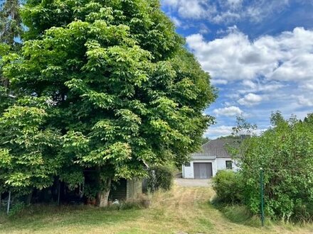 klassischer und gut aufgeteilter Bungalow mit Garagen auf traumhaftem Grundstück in Jesteburg, Ortsteil Lüllau