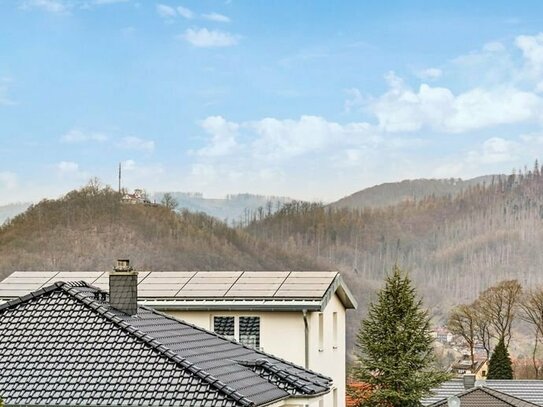 Provisionsfrei - Vermietete Eigentumswohnung mit sonnigem Balkon, wunderschönem Blick und Stellplatz