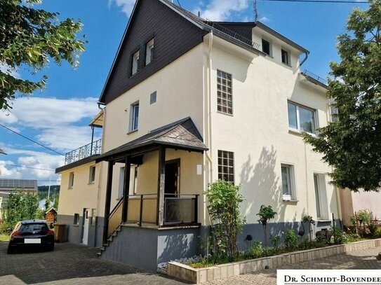 Nähe Montabaur! Ein-/ Zweifamilienhaus mit schönem Gartengrundstück und 3 Garagen in Oberelbert!